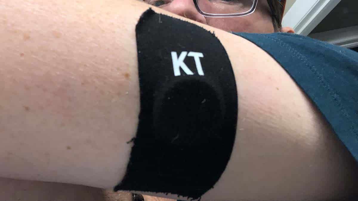 Image of an Abbott FreeStyle Libre glucose sensor protected with KT Tape.