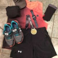 Under Armour Eastside 10K - Race Success. My race kit of late: UA Rush Track Singlet, UA  Qualifier Speedpocket Shorts, Garmin 920 XT Watch, UA Hover Infinite shoes (been trying them out), Running Room compression socks, Northface cap, and UA Qualifier Storm Packable Rain Jacket.